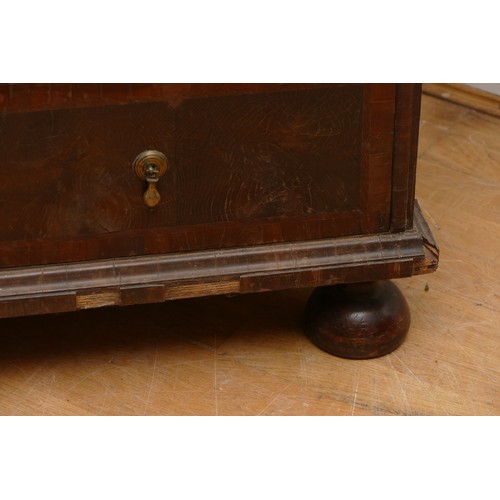 514 - A 17th century laburnum bureau, oyster veneered with walnut cross banding, the overhanging slope wit... 