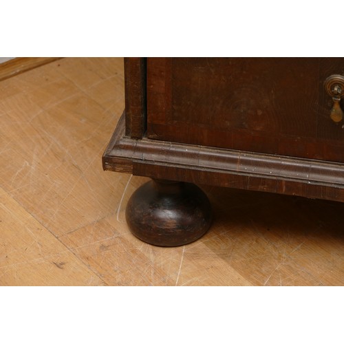 514 - A 17th century laburnum bureau, oyster veneered with walnut cross banding, the overhanging slope wit... 