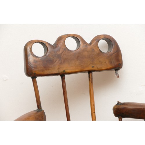 516 - An 18th century Welsh primitive stick chair, elm seat with three holes to the top rail, 60cm across ... 