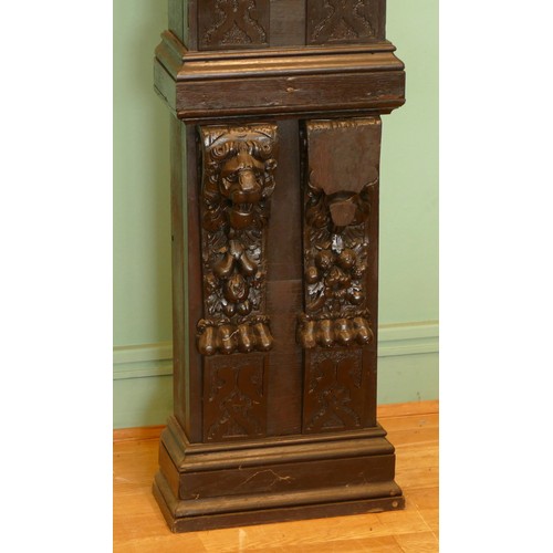 519 - A 19th century and later stained oak fireplace, with central carved panel depicting the baptism of C... 