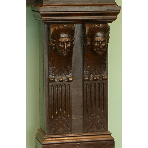 519 - A 19th century and later stained oak fireplace, with central carved panel depicting the baptism of C... 