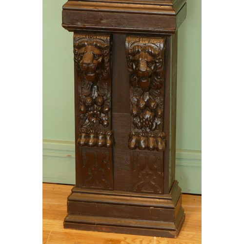 519 - A 19th century and later stained oak fireplace, with central carved panel depicting the baptism of C... 