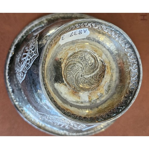 1 - A late 19th century Tibetan silver butter lamp bowl, unmarked, with four character panels, diameter1... 