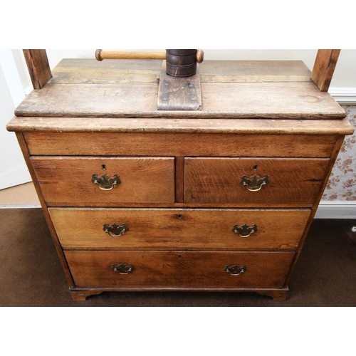 304 - Bedroom 6. A 19th century oak clothes press, with two short over two long drawers, 95 x 52 x 143cm