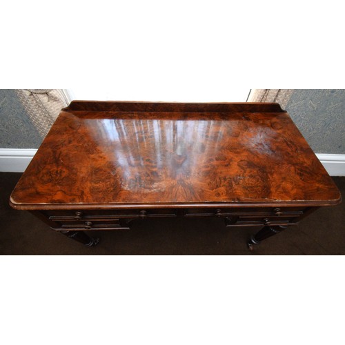 267 - Edwards & Roberts, a Victorian bur walnut and mahogany ladies desk of two long over two short drawer... 