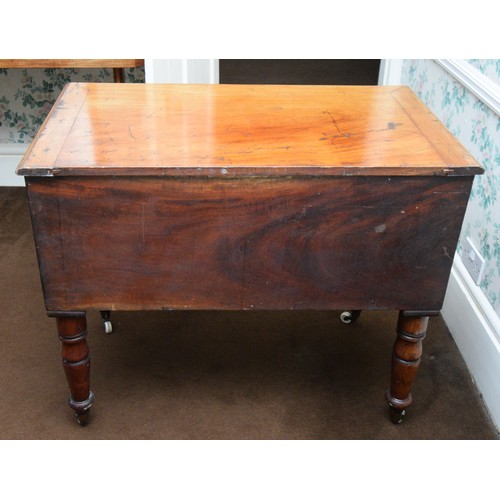 214 - A 19th century mahogany campaign washstand, the hinged lid opening to reveal a tin lined wash bowl, ... 