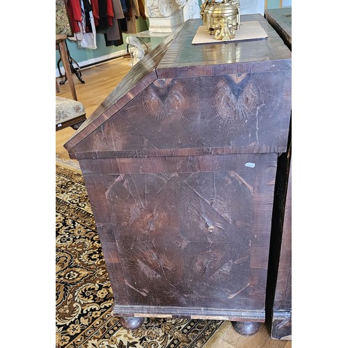 514 - A 17th century laburnum bureau, oyster veneered with walnut cross banding, the overhanging slope wit... 