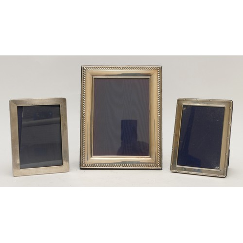 17 - Three silver photograph frames, the largest Sheffield 1995, 22.5 x 17.5cm