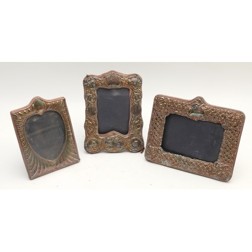 20 - Three silver photograph frames, the largest 22 x 19 cm, London Britannia standard 1986