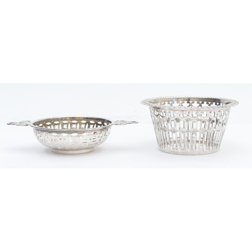 33 - A Victorian silver pierced backet, Birmingham 1899, diameter 9.5cm and a two handled basket, Birming... 