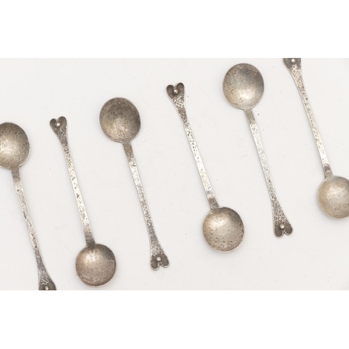 48 - A set of six unmarked Arts & Crafts coffee spoons, hammered finish, 39gm