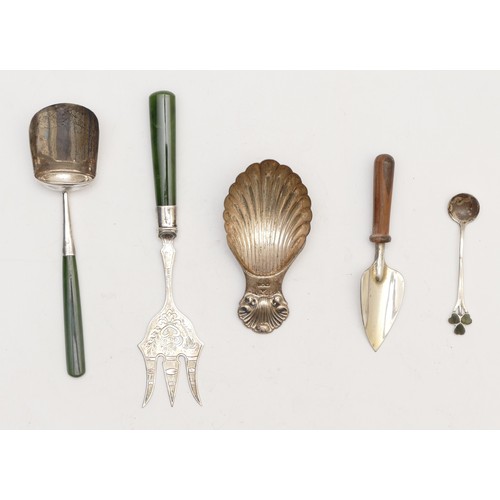 49 - A silver shell bowl caddy spoon, London 1990, a Sterling Silver shovel caddy spoon with nephrite jad... 