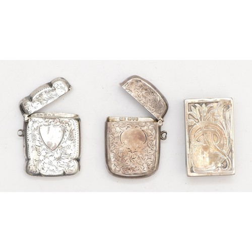 56 - An Edwardian silver vesta case, Chester 1903, another Birmingham 1909 and a 900 standard silver matc... 