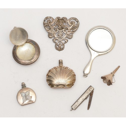 62 - A silver hand bag mirror, Birmingham c.1910 and other silver collectables, 98gm