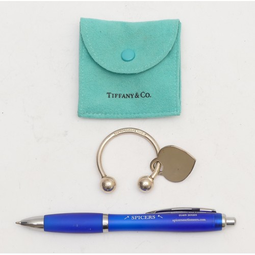 72 - A Tiffany & Co 925 silver key ring, number 523052, 31gm, pouch