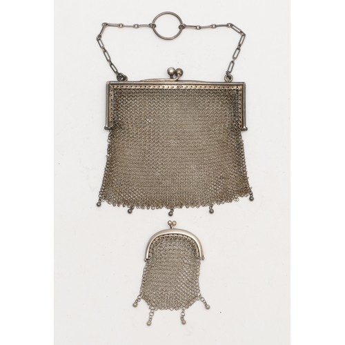 74 - An 800 standard silver chain mail purse, 9.5 x 8.5cm and a small unmarked example, 76gm