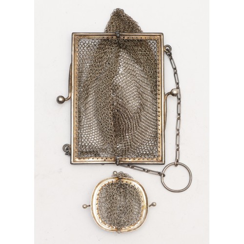 74 - An 800 standard silver chain mail purse, 9.5 x 8.5cm and a small unmarked example, 76gm