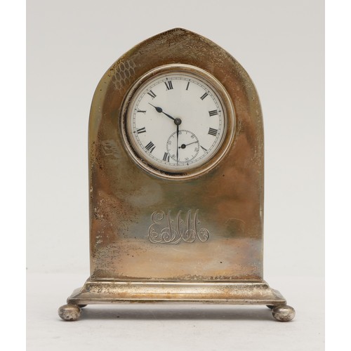 90 - A silver mounted desk clock, hallmarks worn, pocket watch movement, initialled, 11.5cm
Pocket watch ... 