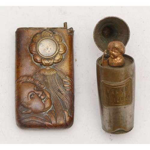 96 - A Japanese brass compass/vesta case, with embossed figures, hinge broken, 6.5cm and a Veuve Cliquot ... 