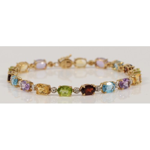 A 9ct gold multi gemstone bracelet, diamond, blue topaz, garnet, amethyst and citrine, 18cm, 7.6g