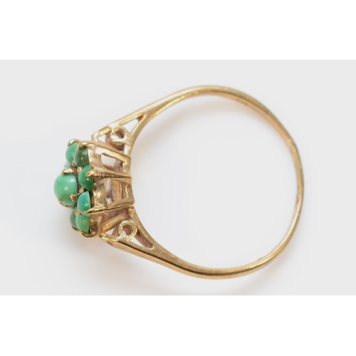 528 - A 9ct gold vintage turquoise cluster ring, O, 2g