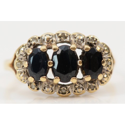 530 - A 9ct gold vintage sapphire and diamond dress ring, J, 2.3g