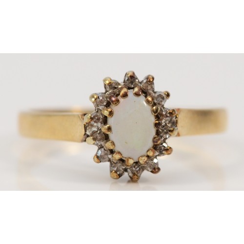 535 - A 9ct gold vintage opal and diamond cluster ring, M, 1.9g