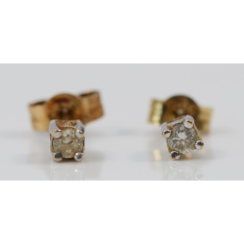 547 - A pair of 9ct gold diamond solitaire earrings, 3mm, 0.5g