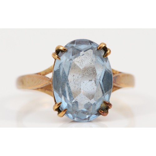 557 - A 9ct gold vintage blue gemstone dress ring, K 1/2, 2.8g