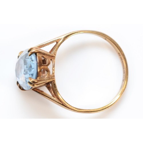 557 - A 9ct gold vintage blue gemstone dress ring, K 1/2, 2.8g