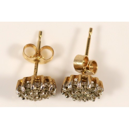 566 - A pair of 9ct gold diamond cluster earrings with scroll backs, 6mm, 1.4g