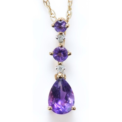 568 - A 9ct gold amethyst and diamond drop pendant with chain, 16mm pendant, 2g