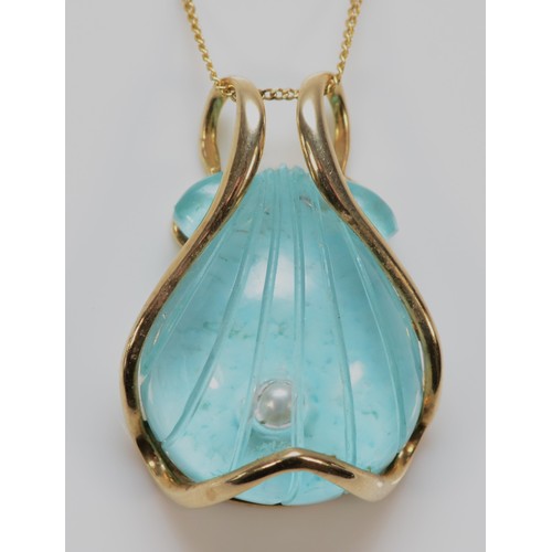 569 - A 9ct gold cultured pearl, rock quartz and blue hardstone shell pendant with chain, 25mm drop, 7.4g