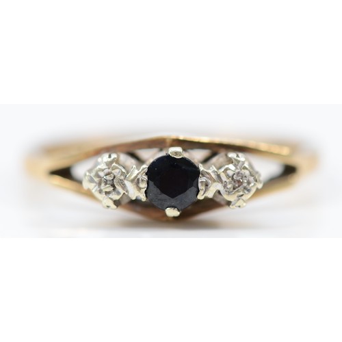 575 - A 9ct gold vintage sapphire and diamond three stone ring, P, 2.3g