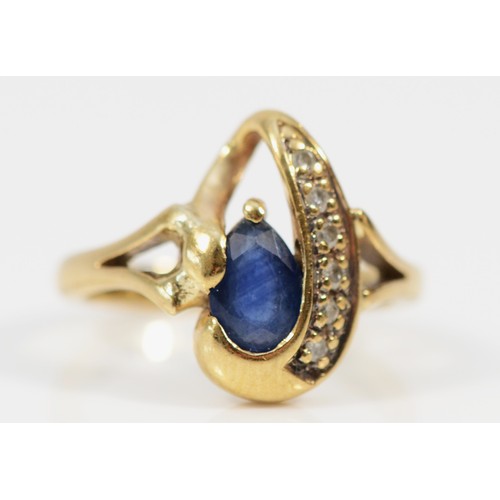 591 - A 9ct gold sapphire and seven diamond dress ring, E 1/2, 2.9g