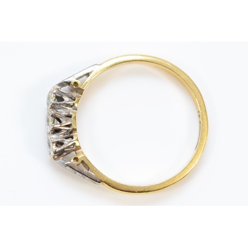 593 - An 18ct gold vintage diamond three stone ring, N, 2.4g