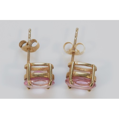 595 - A pair of 9ct gold coated pink topaz earrings with scroll backs, 8mm, 2.2g