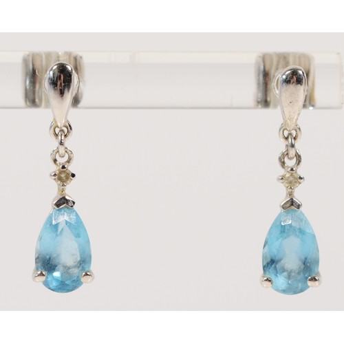 612 - A pair of 9ct white gold diamond and topaz drop earrings, 18mm drop, 1.8g