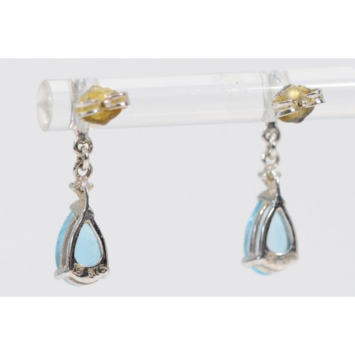 612 - A pair of 9ct white gold diamond and topaz drop earrings, 18mm drop, 1.8g