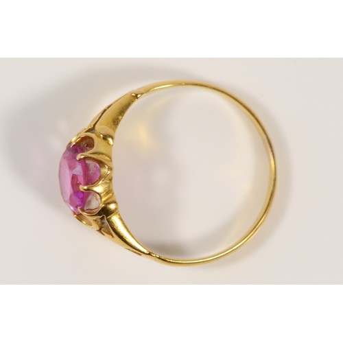 616 - An 18ct gold vintage pink gemstone dress ring with openwork shoulder detail, N, 2.6g