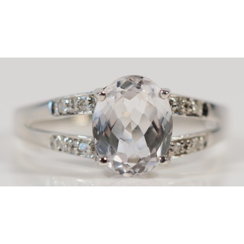 625 - A 9ct white gold spodumene and diamond dress ring, N 1/2, 2.4g