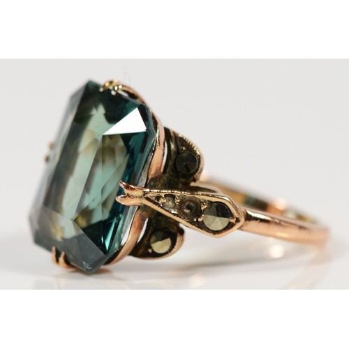 628 - A 9ct gold green gemstone and marcasite dress ring, K, 5.2g