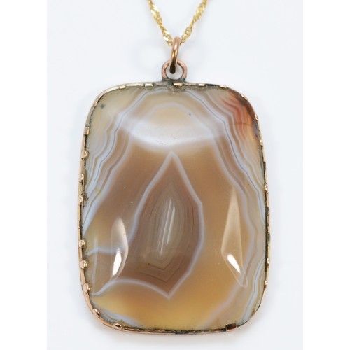 638 - A 9ct gold banded agate pendant with chain, 37mm x 27mm, 10.7g