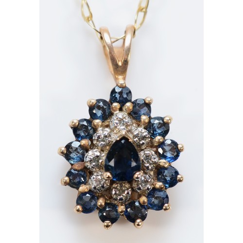 639 - A 9ct gold sapphire and diamond pendant with chain, 13mm, 2.6g