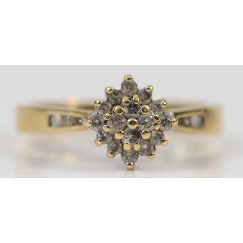 644 - A 9ct gold diamond cluster ring, M 1/2, 2.4g