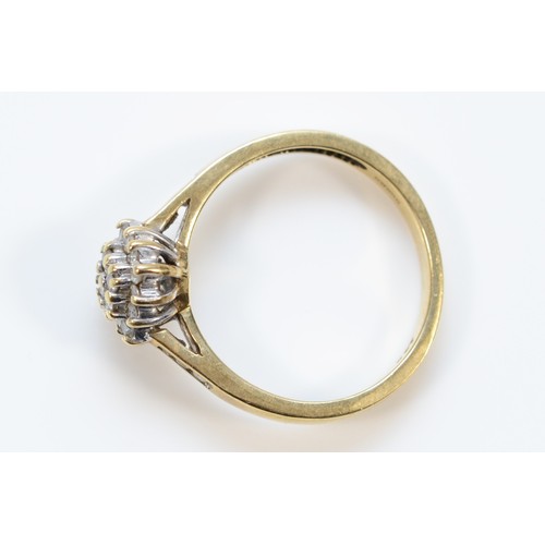 644 - A 9ct gold diamond cluster ring, M 1/2, 2.4g