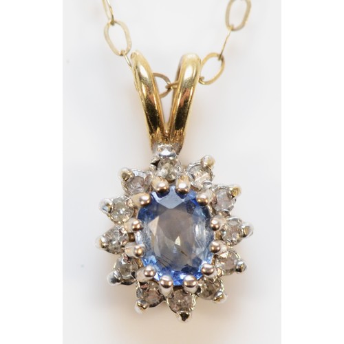 649 - A 9ct gold sapphire and seven diamond cluster pendant, 6mm, 1.2g