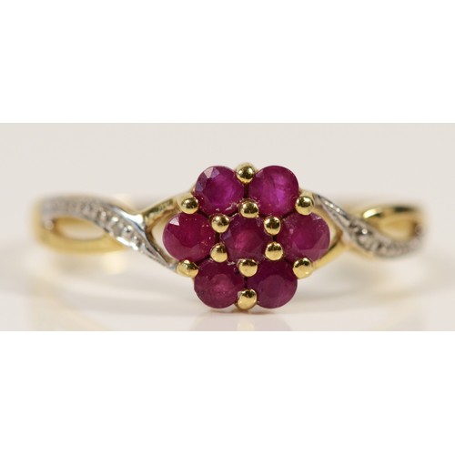 654 - A 9ct gold ruby and diamond cluster ring, P, 1.6g