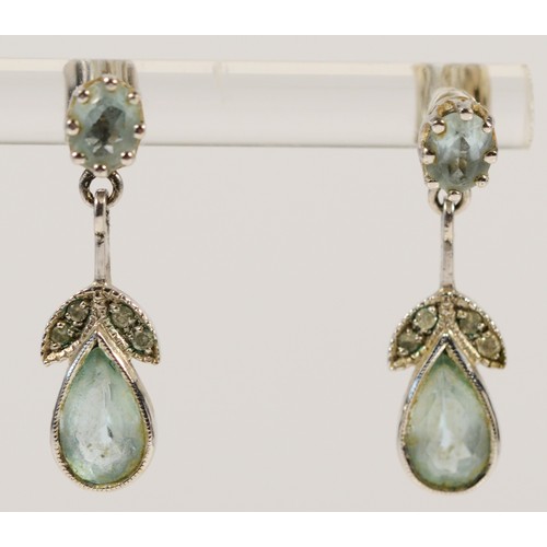 655 - A pair of 9ct white gold vintage style blue topaz and diamond drop earrings, 23mm drop, 2.7g