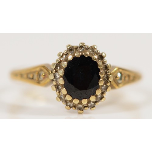 658 - A 9ct gold vintage sapphire and diamond cluster ring, K 1/2, 2.7g